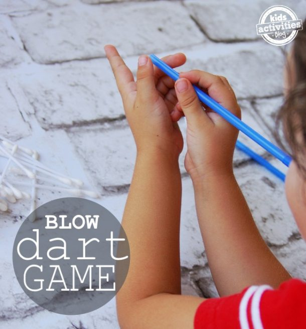 Qtip and straw blow dart came with child blowing q tips from a straw - kids activities blog