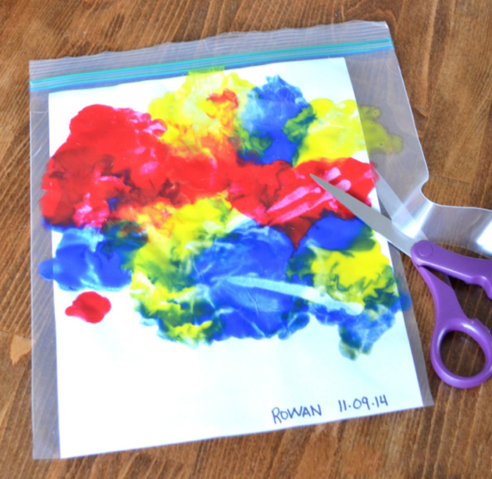 Image shows a paint craft and a pair of scissors. Idea from Can Do Kiddo.