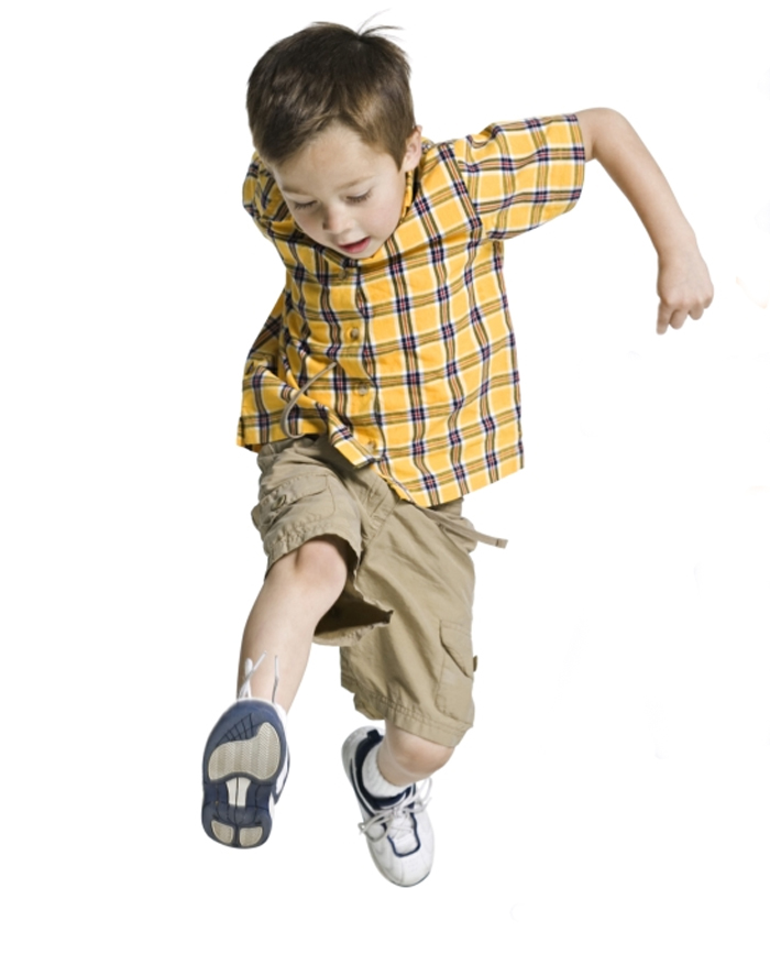 Image shows a kid jumping and having fun. From KAB