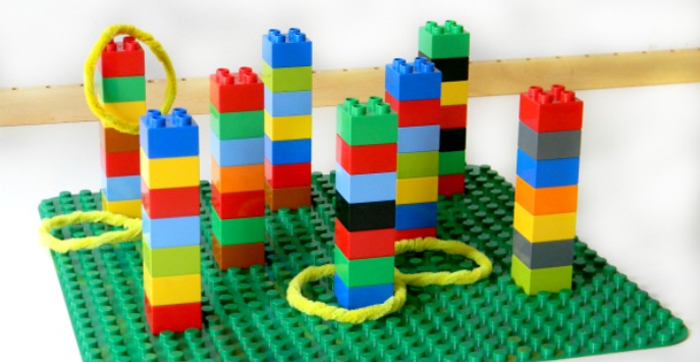 Image shows a set of LEGO duplo and toss rings on it. From Stir the wonder
